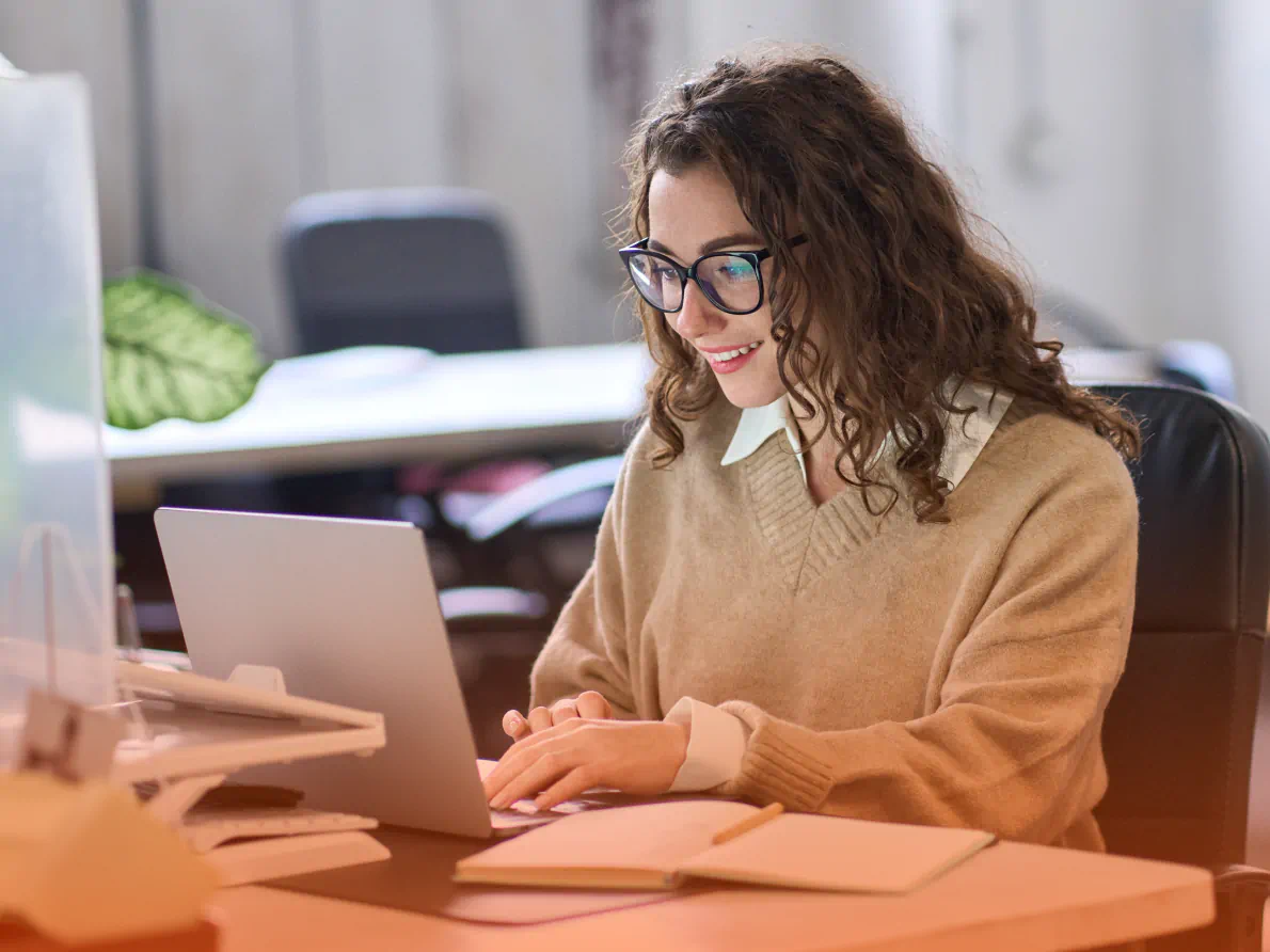 Professional woman using laptop computer