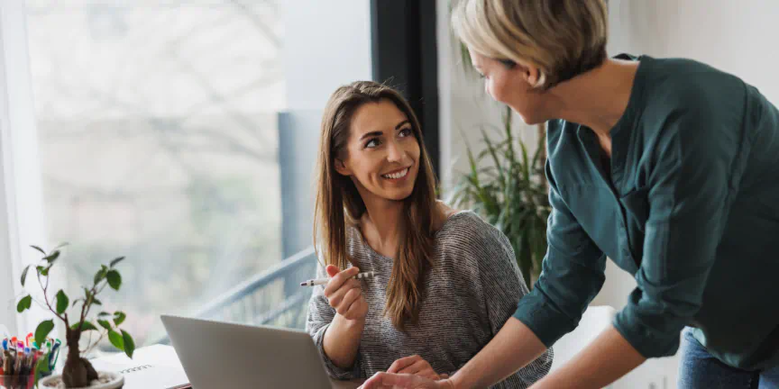 Two coworkers in discussion